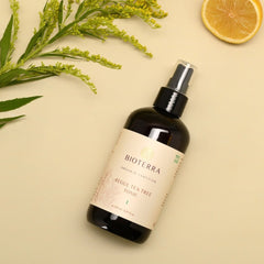 Facial toner bottle, dark brown glass, white label, Bioterra Organic brand
