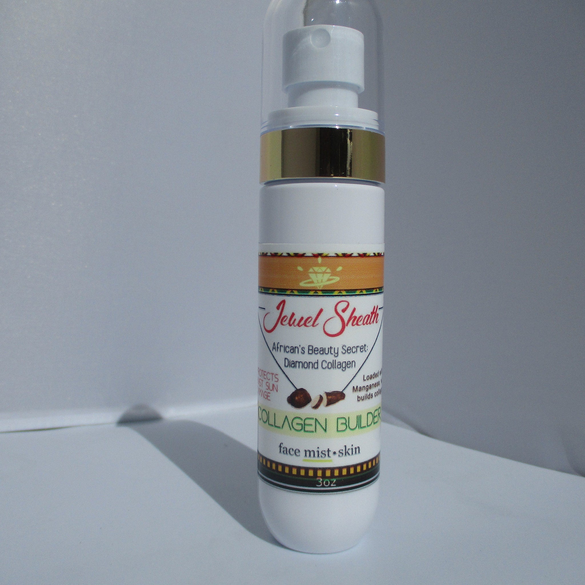 Toner bottle with white, gold, and patterned label, Jewel Sheath brand visible