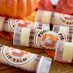 Pumpkin Pie Lip Balm tubes with plaid pattern and clear plastic, for lip care