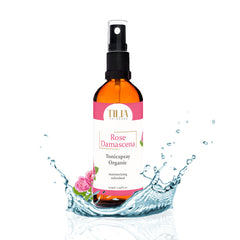 Tonic spray bottle with brown glass, black pump, and pink label, TILIA Skincare brand