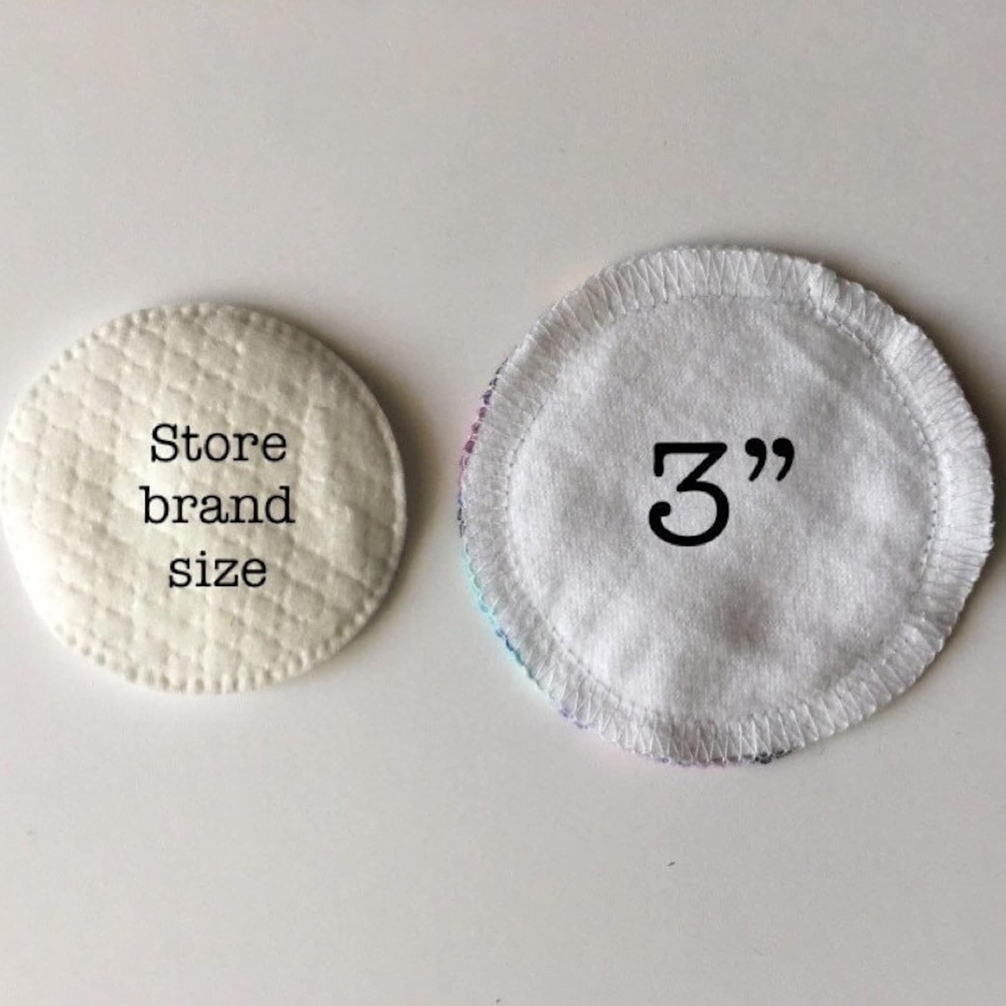 Reusable cotton pads, white fabric with stitched edges and "Store brand size" and "3" printed on pads
