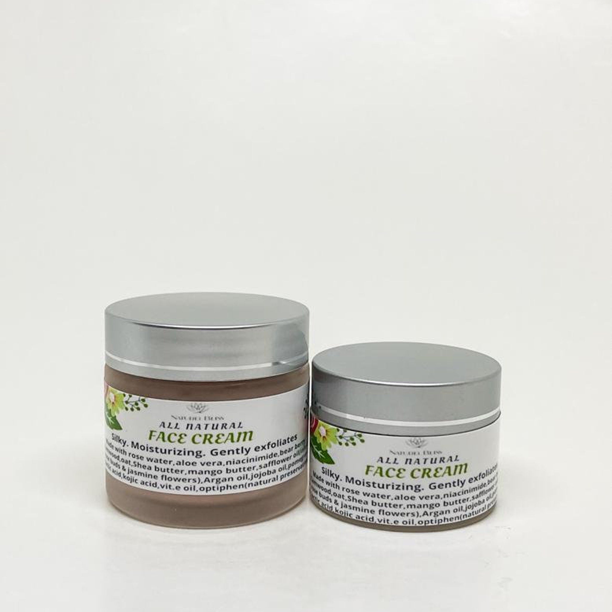 Eco-friendly glass jar of vegan oat face cream with camwood, showcasing minimalist beige label and creamy texture