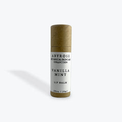 Lip balm tube in brown cardboard with white label, Abyrose Vanilla Mint product
