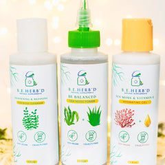 Sea Moss Skincare: White bottles with green, yellow, and white caps, B.E. HERB'D branding visible on labels