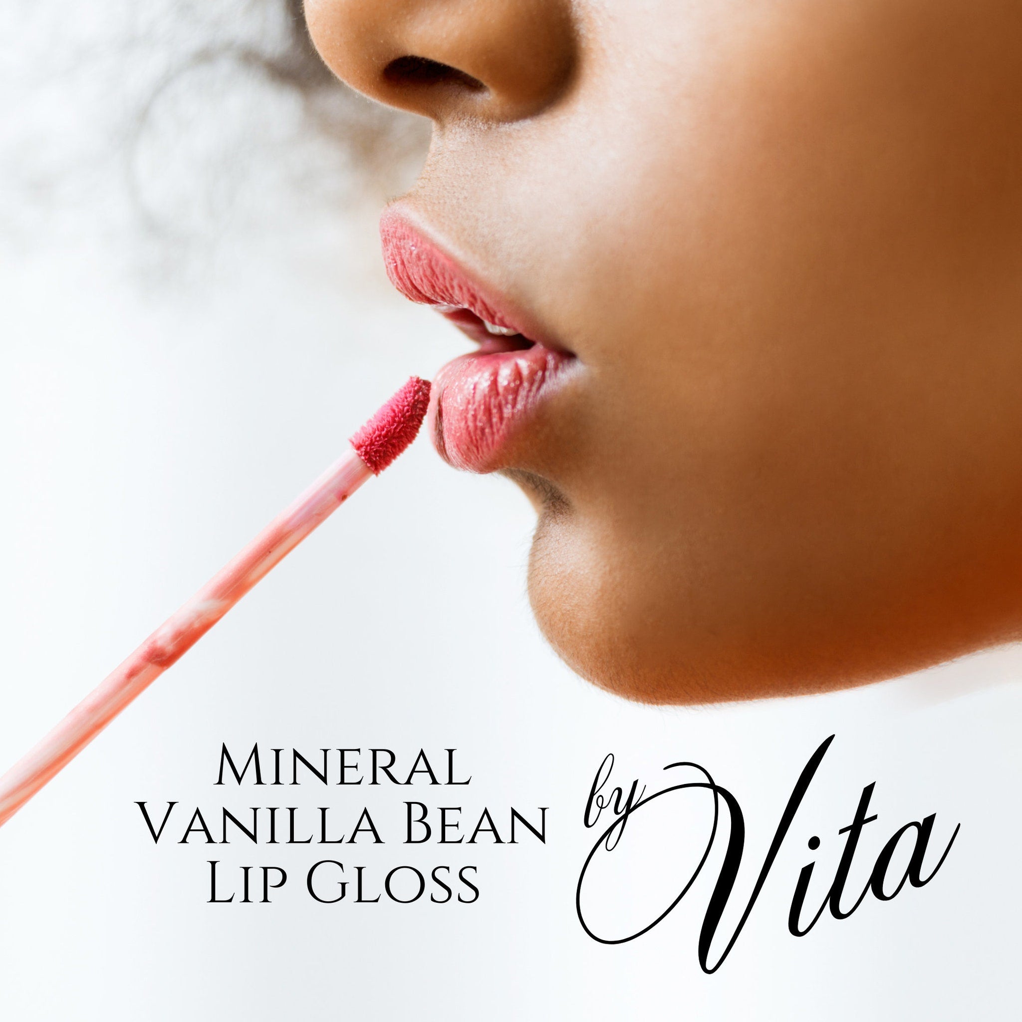 Lip gloss with pink color and applicator, by Vita brand, being applied to lips
