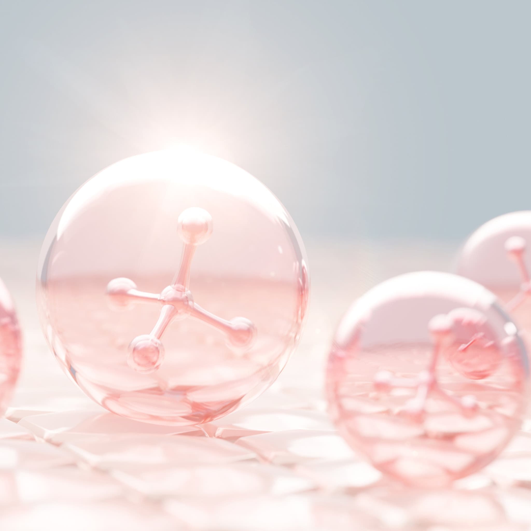Molecule spheres with pink and clear color, on a white tiled surface with a light flare