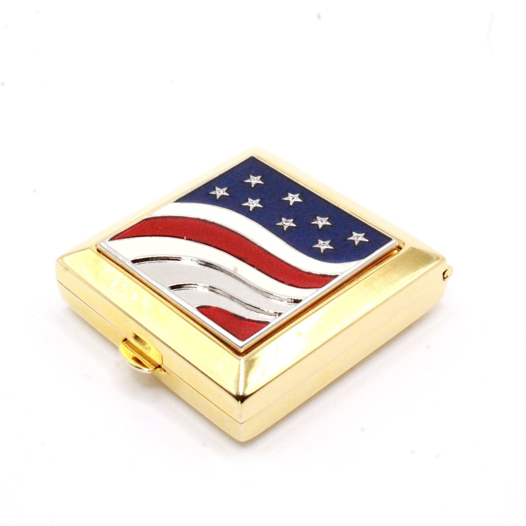 Compact case with American flag design, gold metal, red and blue enamel, square shape