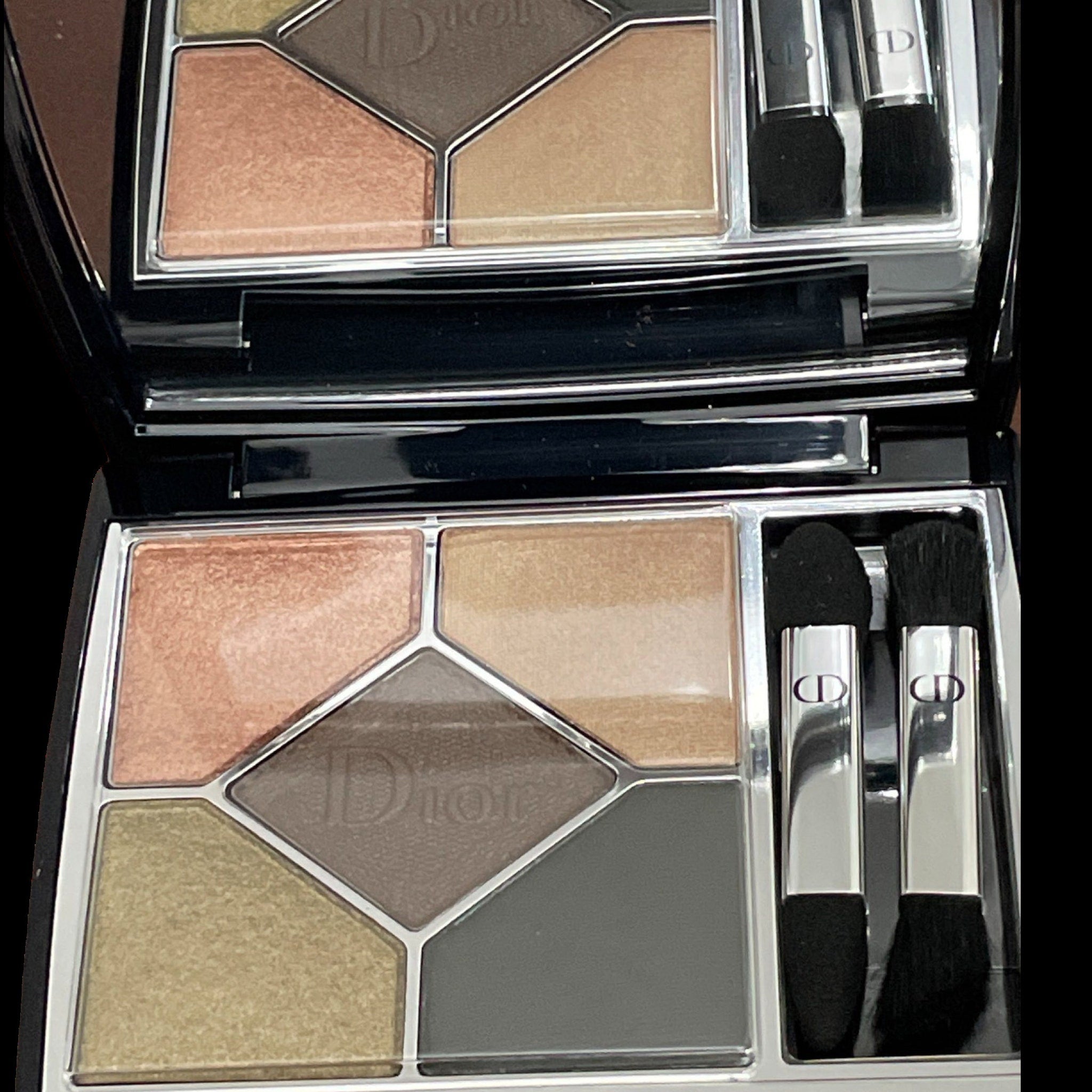 Dior eyeshadow palette with new seasonal shades displayed in sleek black compact with gold logo