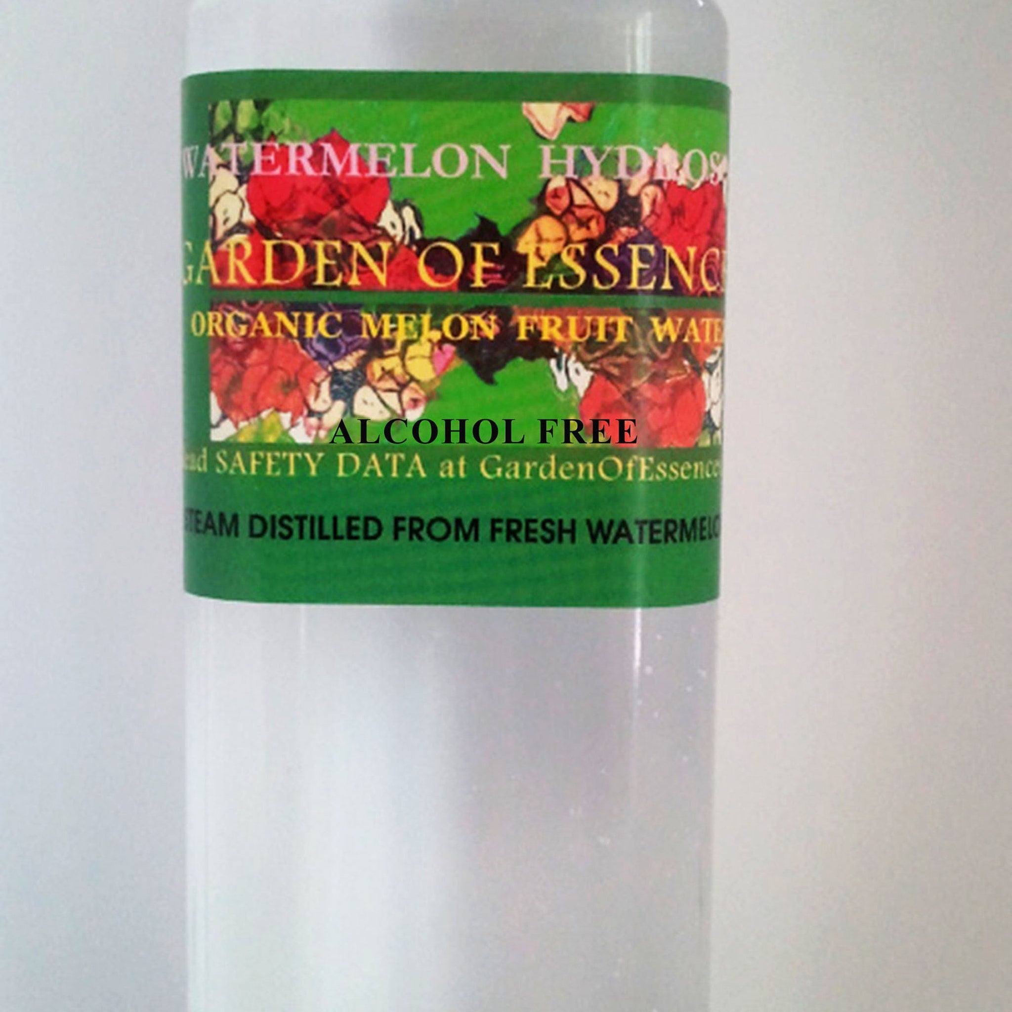 Toner bottle with green and red label, Garden of Essence text visible, for facial use