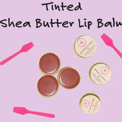 Tinted lip balm in round gold tins, with pink applicators, and Lip Love Organics label