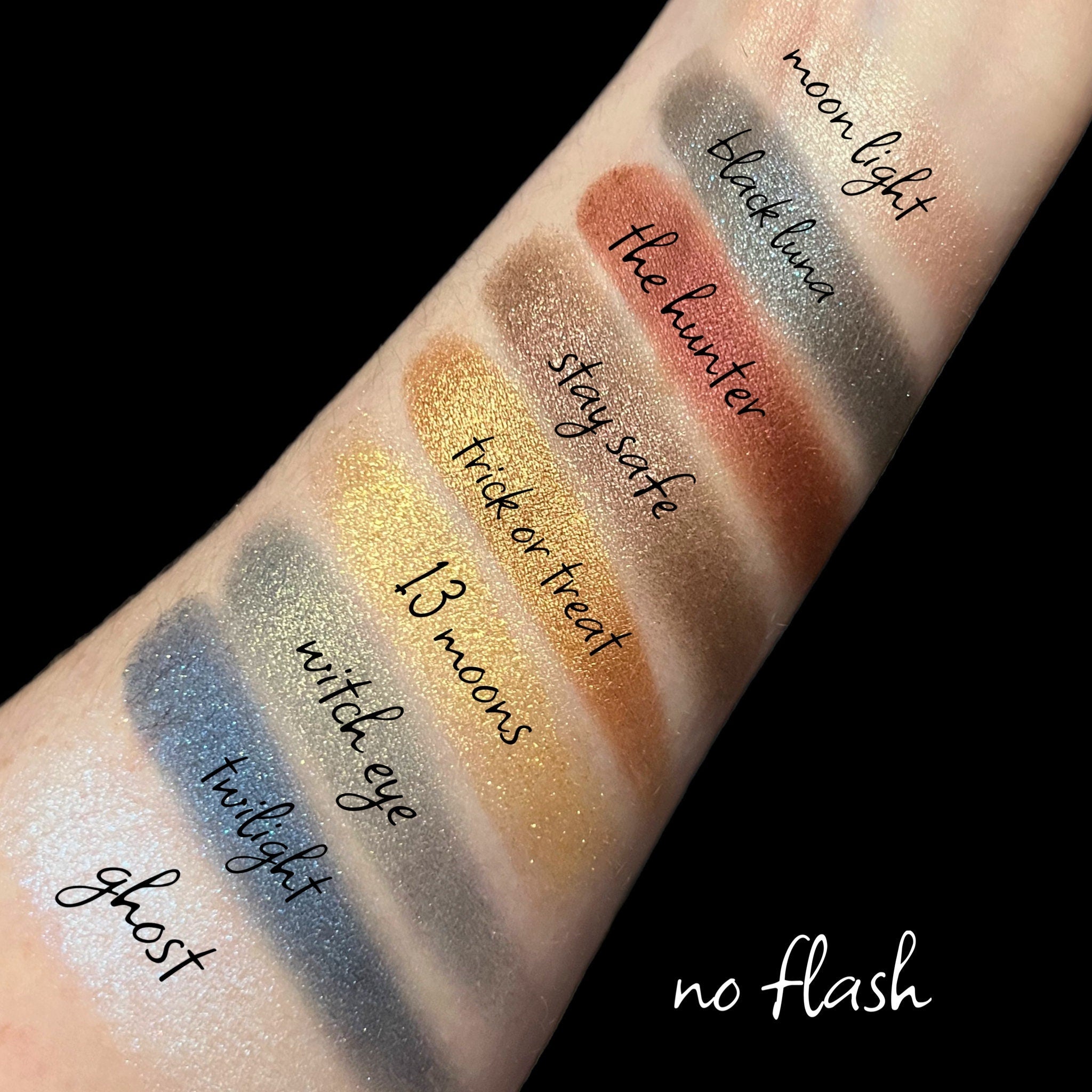 Open Vegan Blue Moon Eyeshadow Palette showing six vibrant blue shades in sleek black compact