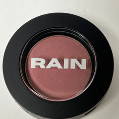Single pan of deep merlot eyeshadow with smooth matte finish in black compact