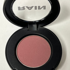 Close-up of deep merlot eyeshadow pan showing rich matte texture and true color saturation