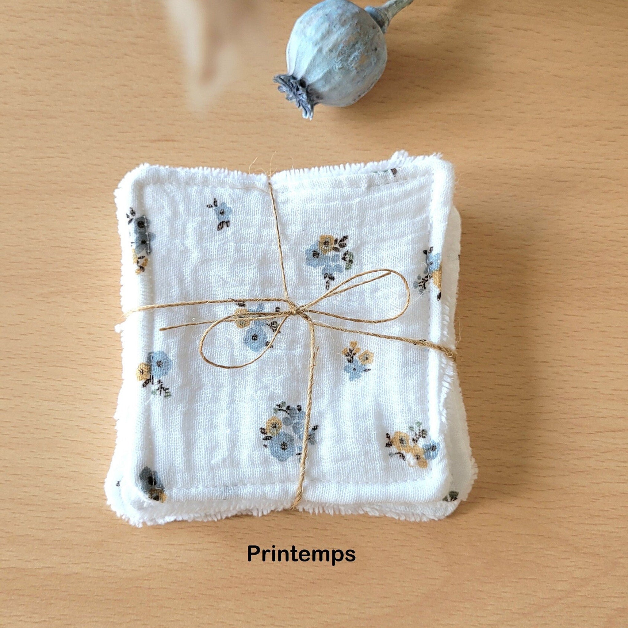 Close-up of soft bamboo and cotton gauze wipes showing delicate texture and natural fibers for gentle skincare