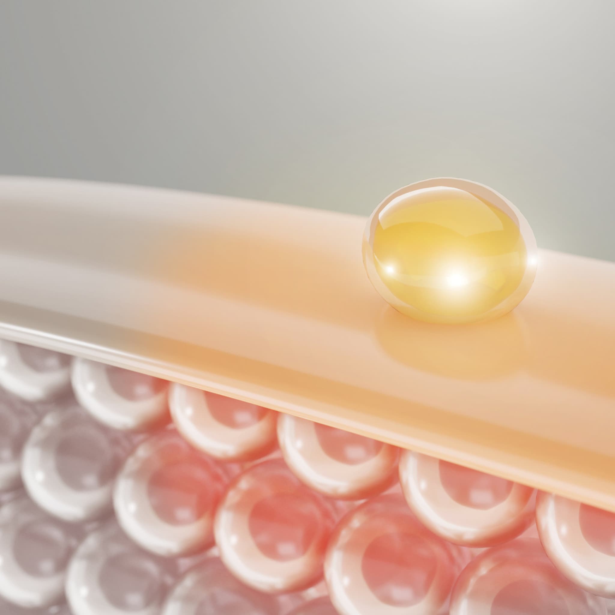 Capsule spheres with yellow, white, and red tones, abstract illustration of skin layers