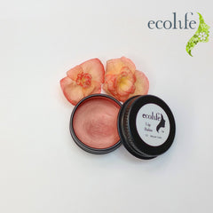 Lip balm with metallic coral color in black tin with Ecolife brand and flowers