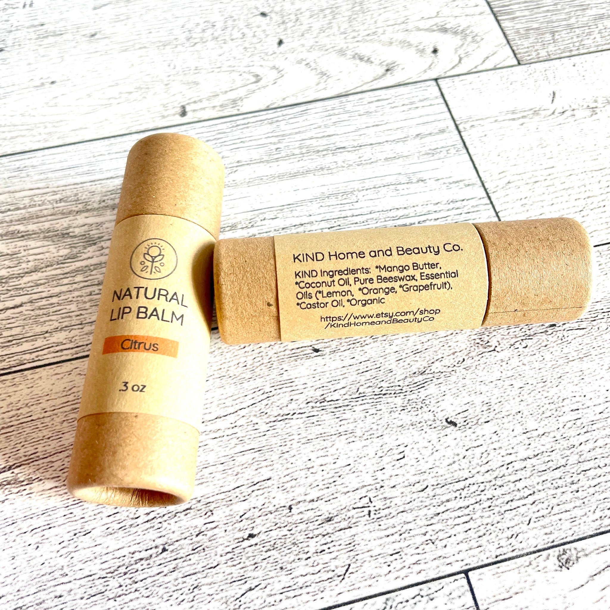 Natural lip balm tubes in brown cardboard, with "Citrus" label, from Kind Home & Beauty Co
