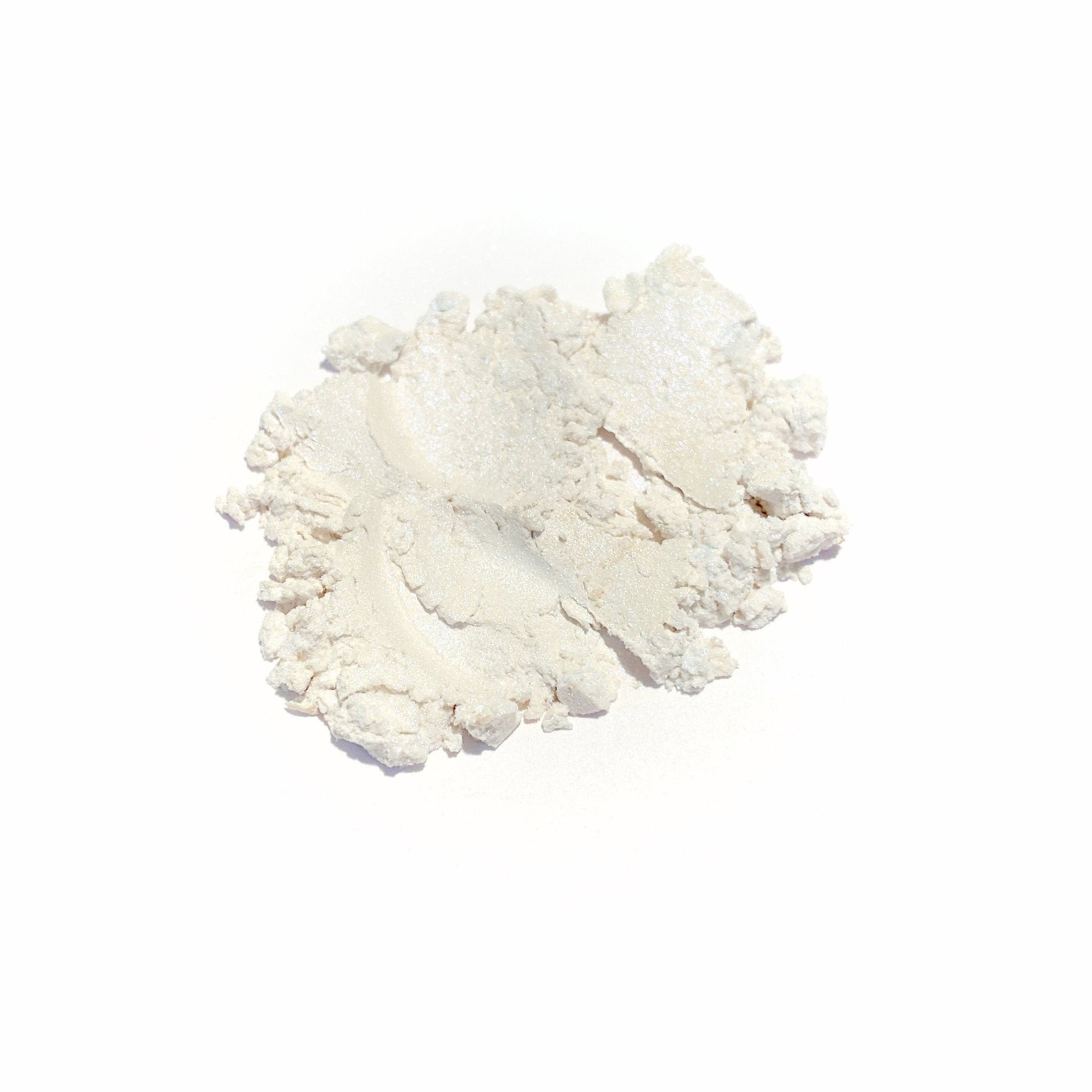 Eye shadow powder, off-white with shimmer, textured powder on white background