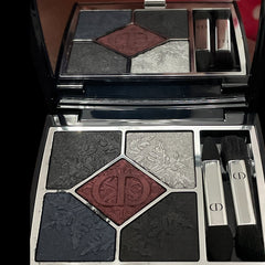 Side view of Dior eyeshadow palette showcasing new shimmering bronze and mauve shades in sleek black compact