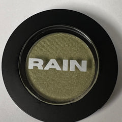 Shimmering golden sage eye shadow in compact with reflective metallic casing
