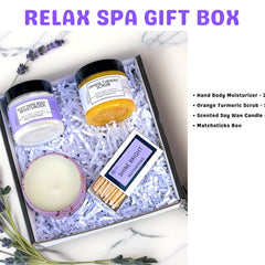 Spa gift box with white, black, and lavender accents, including "SHINE BRIGHT" matchsticks and products inside a box