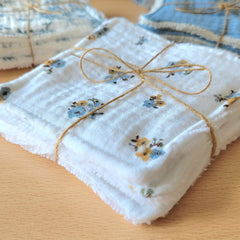 Close-up of soft bamboo and cotton gauze wipes showing delicate texture and natural fibers for gentle skincare