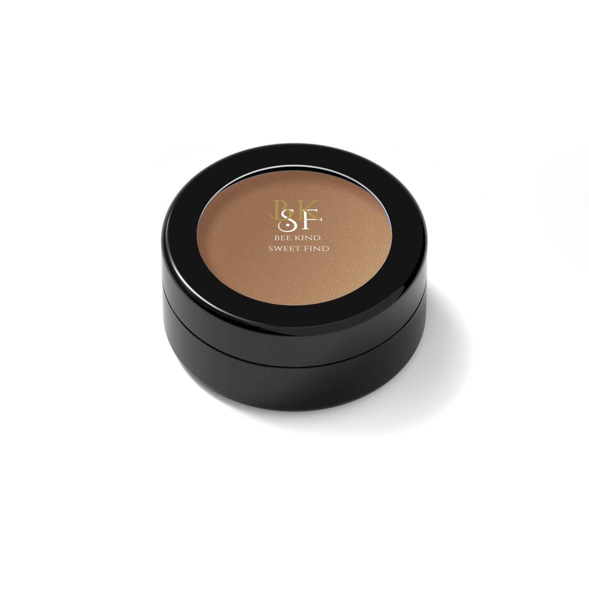 Powder compact with brown powder, black case, and BKSF logo on white background