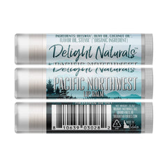 Lip balm tube with white, blue, and black label, Delight Naturals brand, Pacific Northwest design