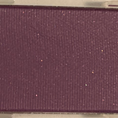 Shimmering Iris Mineral Eye Shadow pot with metallic purple powder and satin finish, shown open with brush.