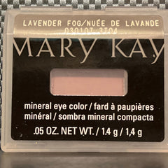 Side view of matte lavender mineral eye shadow pot showing smooth powder texture and compact size