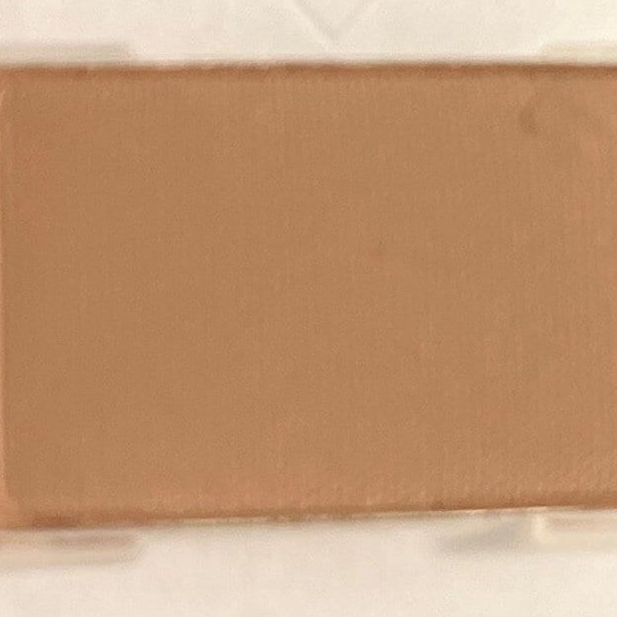 Single matte driftwood brown mineral eye shadow pan with smooth powder texture in compact black case