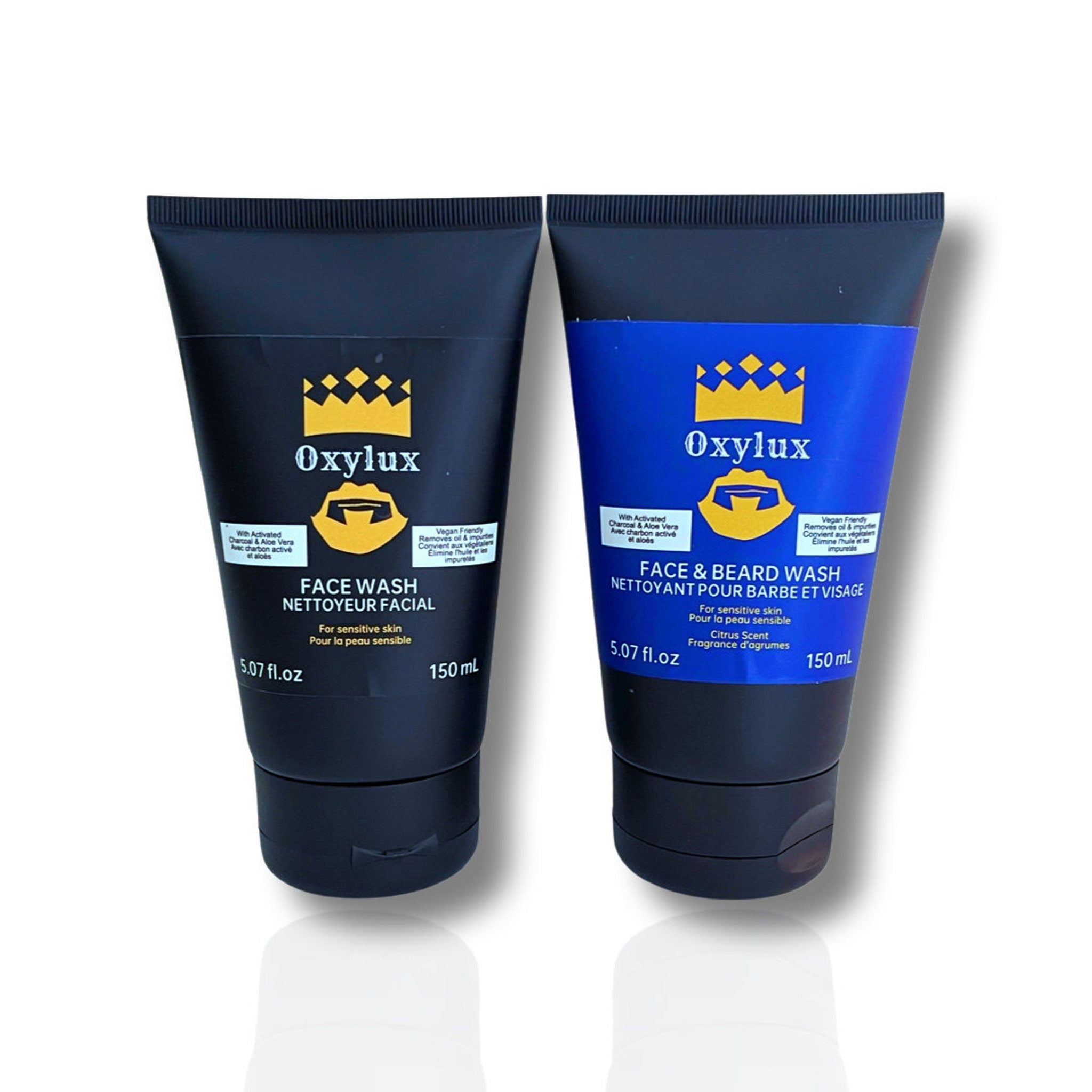Facial cleanser tubes, black and blue plastic, Oxylux brand text visible