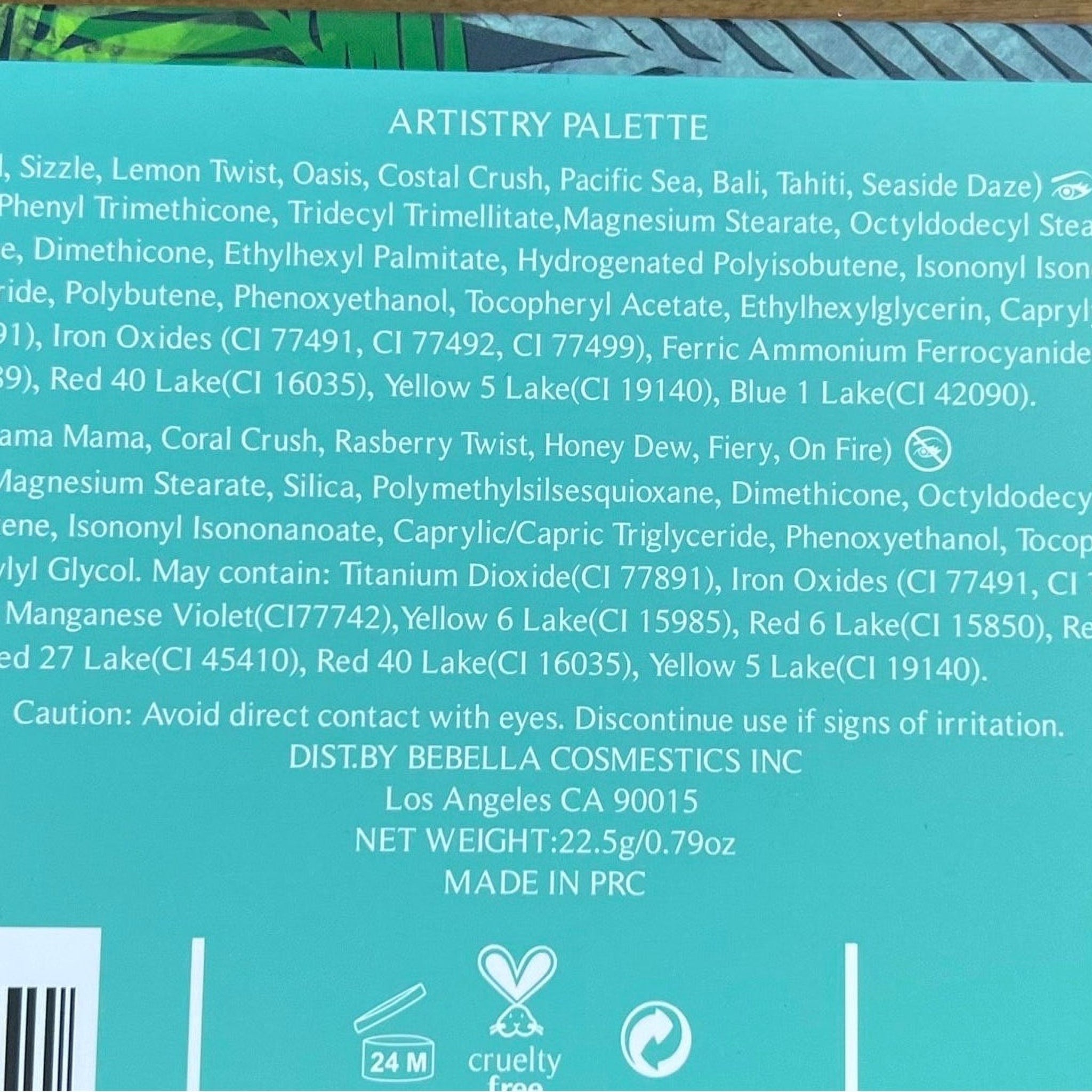 Artistry palette label with white text on a teal background, with cruelty-free symbol