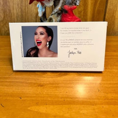 Jaclyn Hill makeup box, white with text, photo of woman, brand name visible