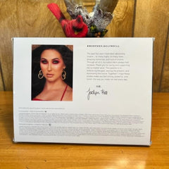 Eyeshadow palette with red and white packaging, and Jaclyn Hill signature