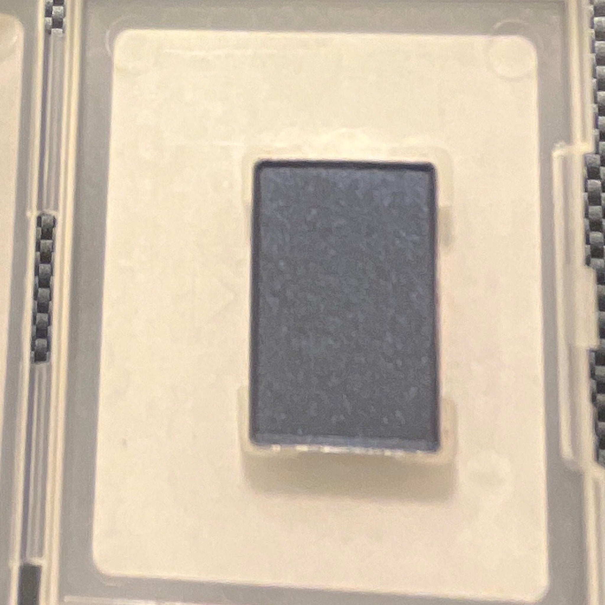Square compact of Starry Night mineral eyeshadow with deep blue shimmer and silver flecks in sleek black case