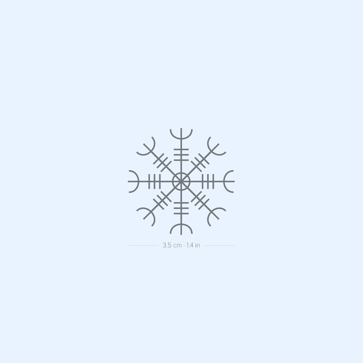 Two sleek black temporary tattoo sheets with intricate Norse rune designs, resting on a clean white surface.