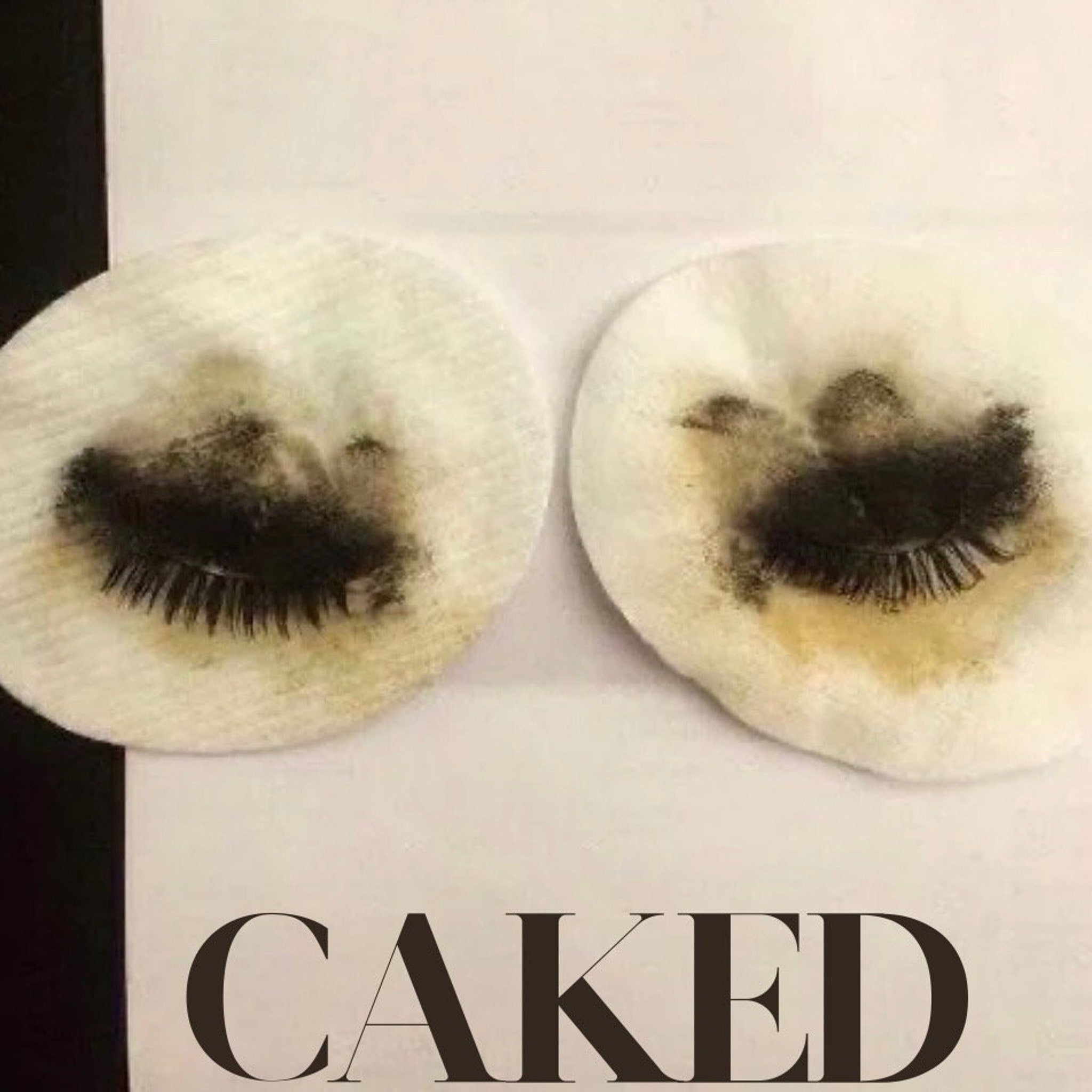 Makeup remover pads with white cotton, black residue, and text "CAKED" at the bottom