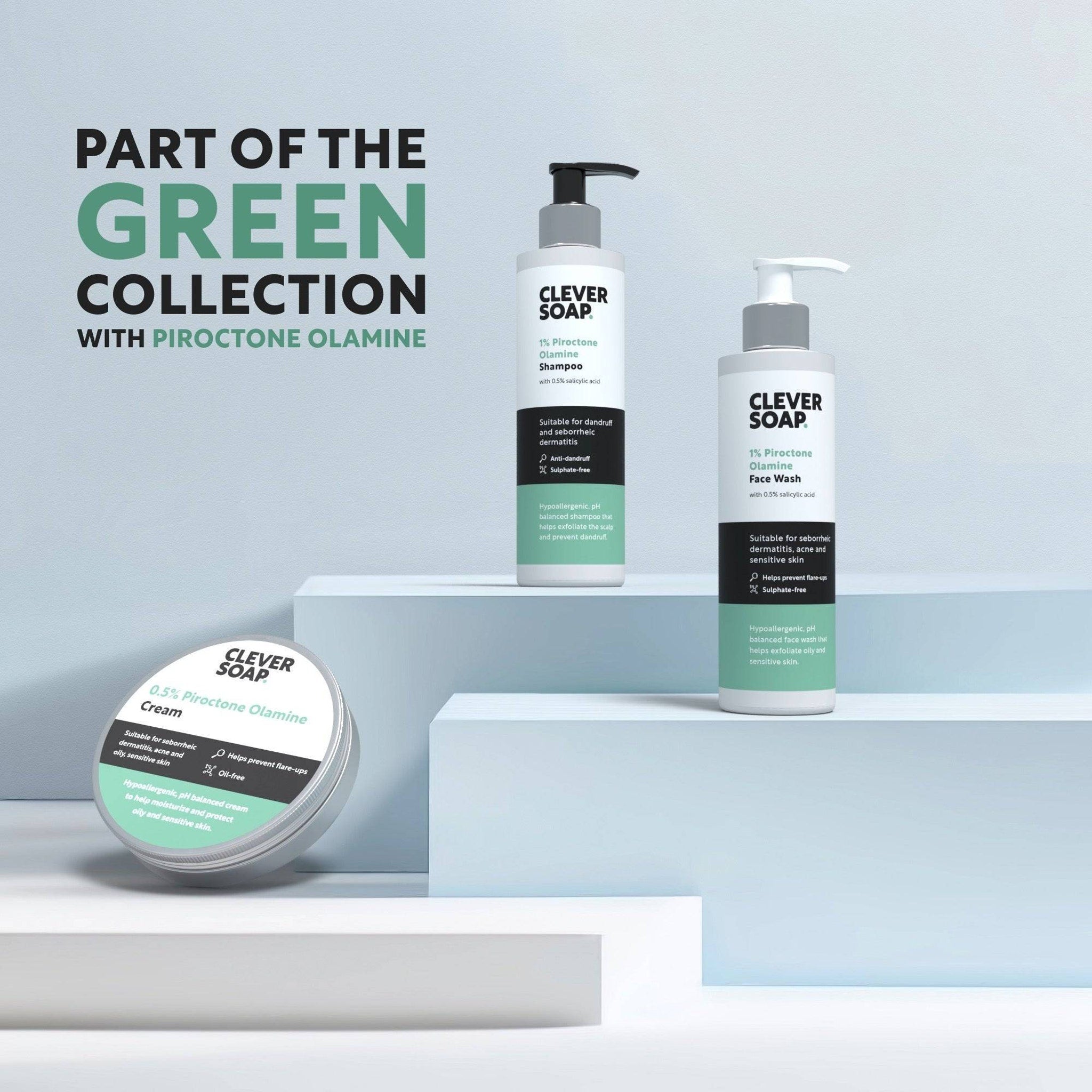 Clever Soap products, white bottles and jar with black and green labels, on a light blue background