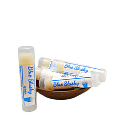 Lip balm tubes with white and blue labels, clear caps, and yellow balm inside, Blue Slushy brand