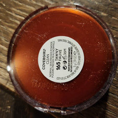 Close-up of Covergirl powder eye shadow compact with mirrored lid and gradient bronze shades