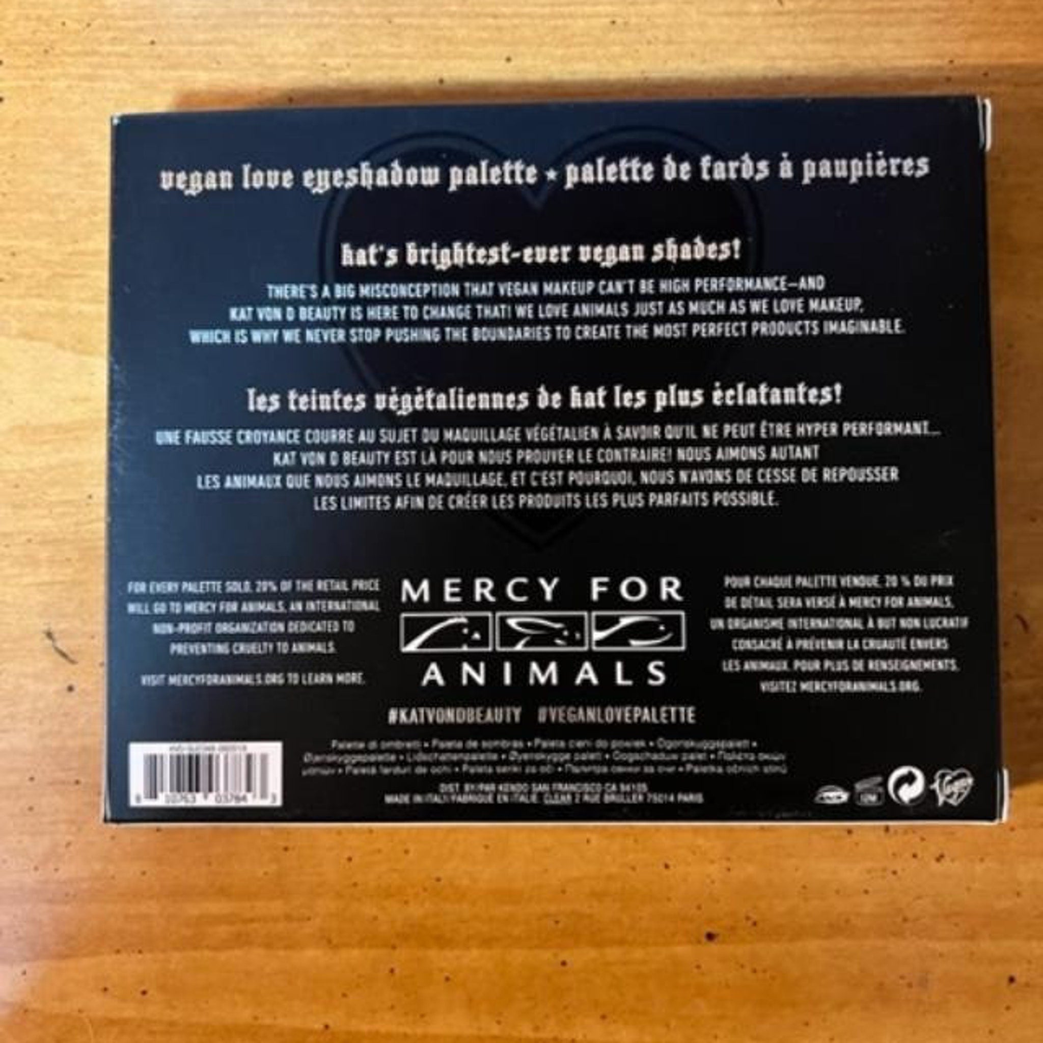 Eyeshadow palette box, black with white text, Kat Von D Beauty brand name visible