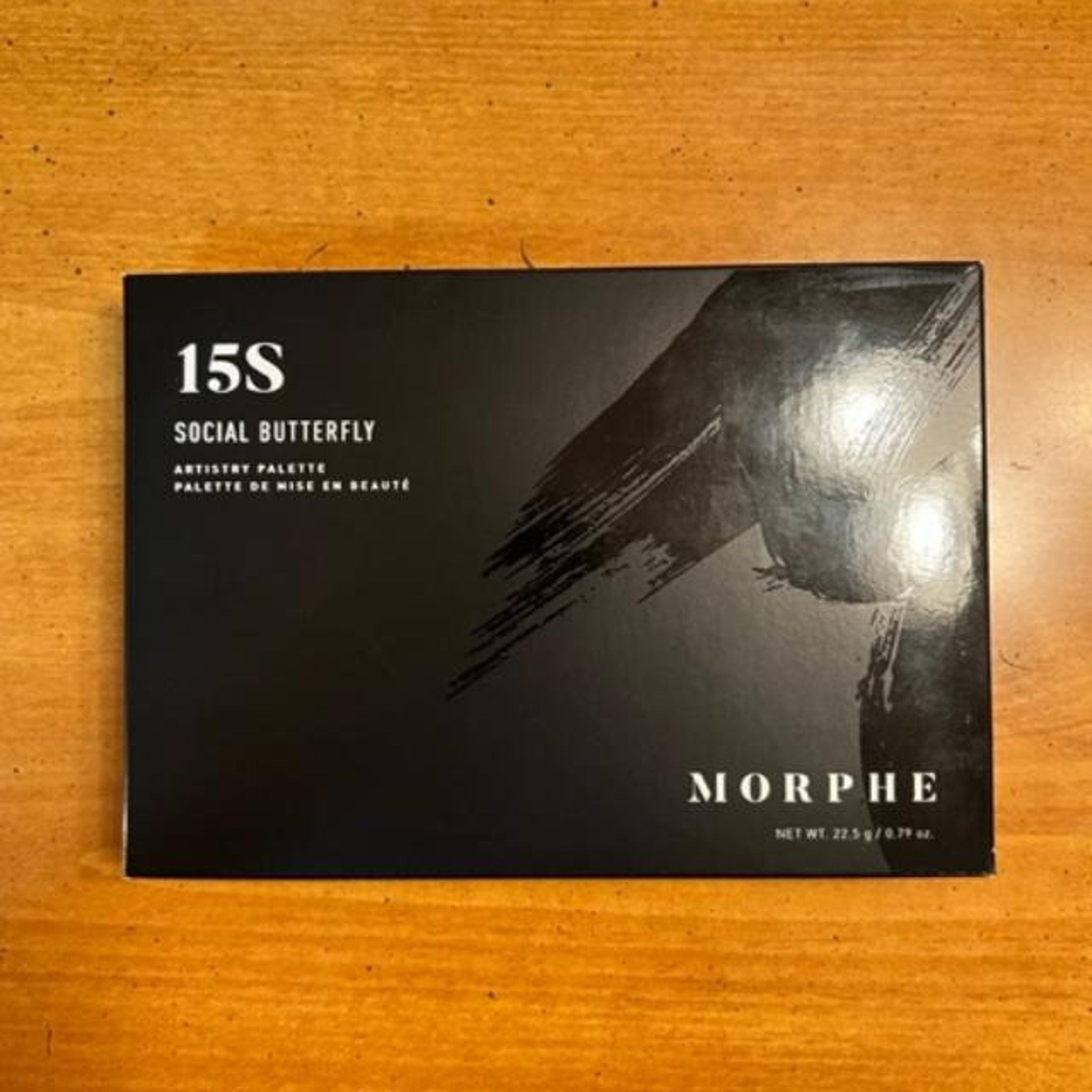 Eyeshadow palette, black rectangular box with Morphe text, Social Butterfly palette name visible