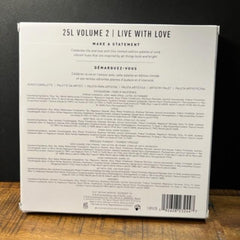 Eyeshadow palette with white packaging, black text, and product information on the back