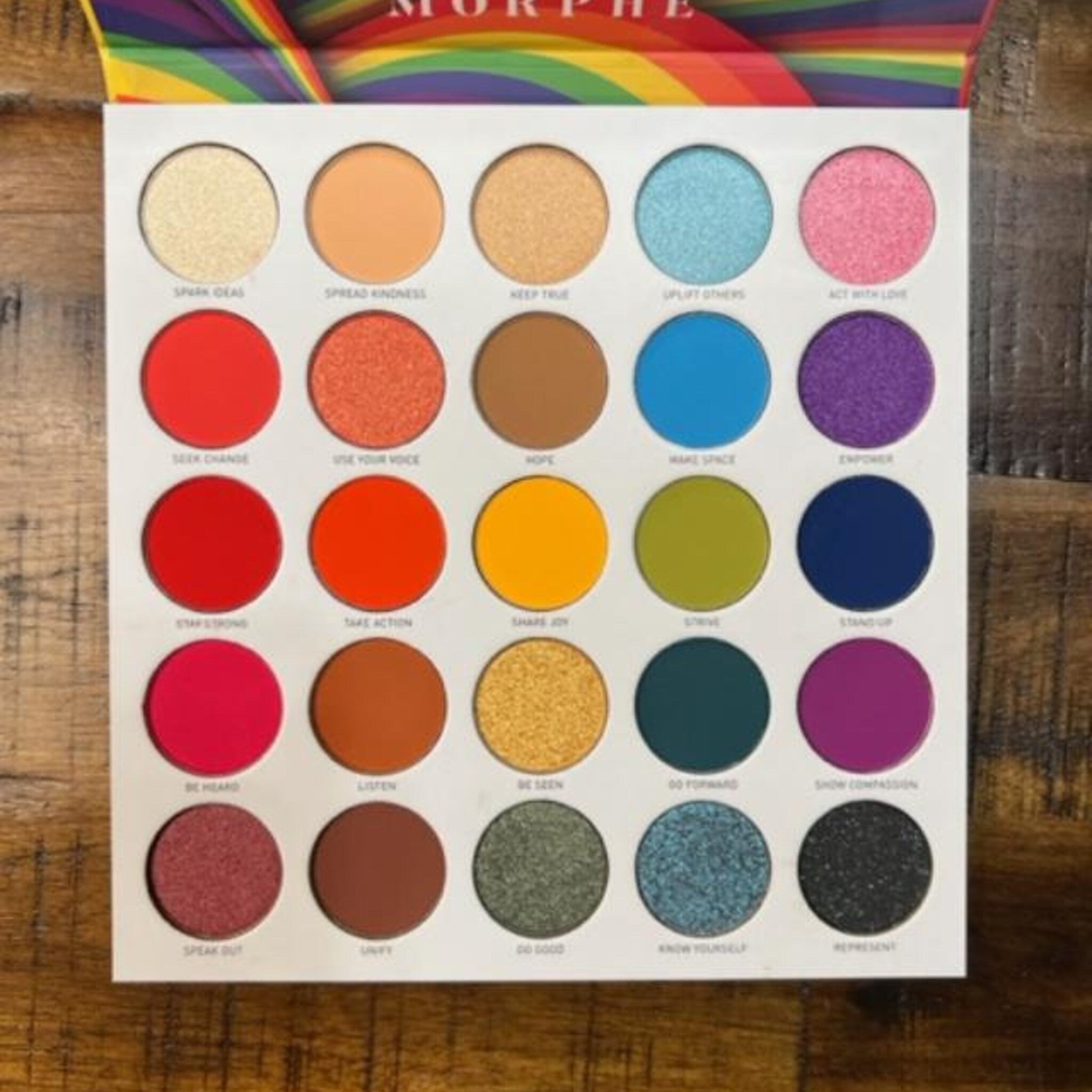 Eyeshadow palette with multiple colors, round pans, and Morphe branding on top