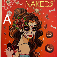 Halloween eye shadow palette with vibrant orange, black, and purple shades in a sleek black compact.