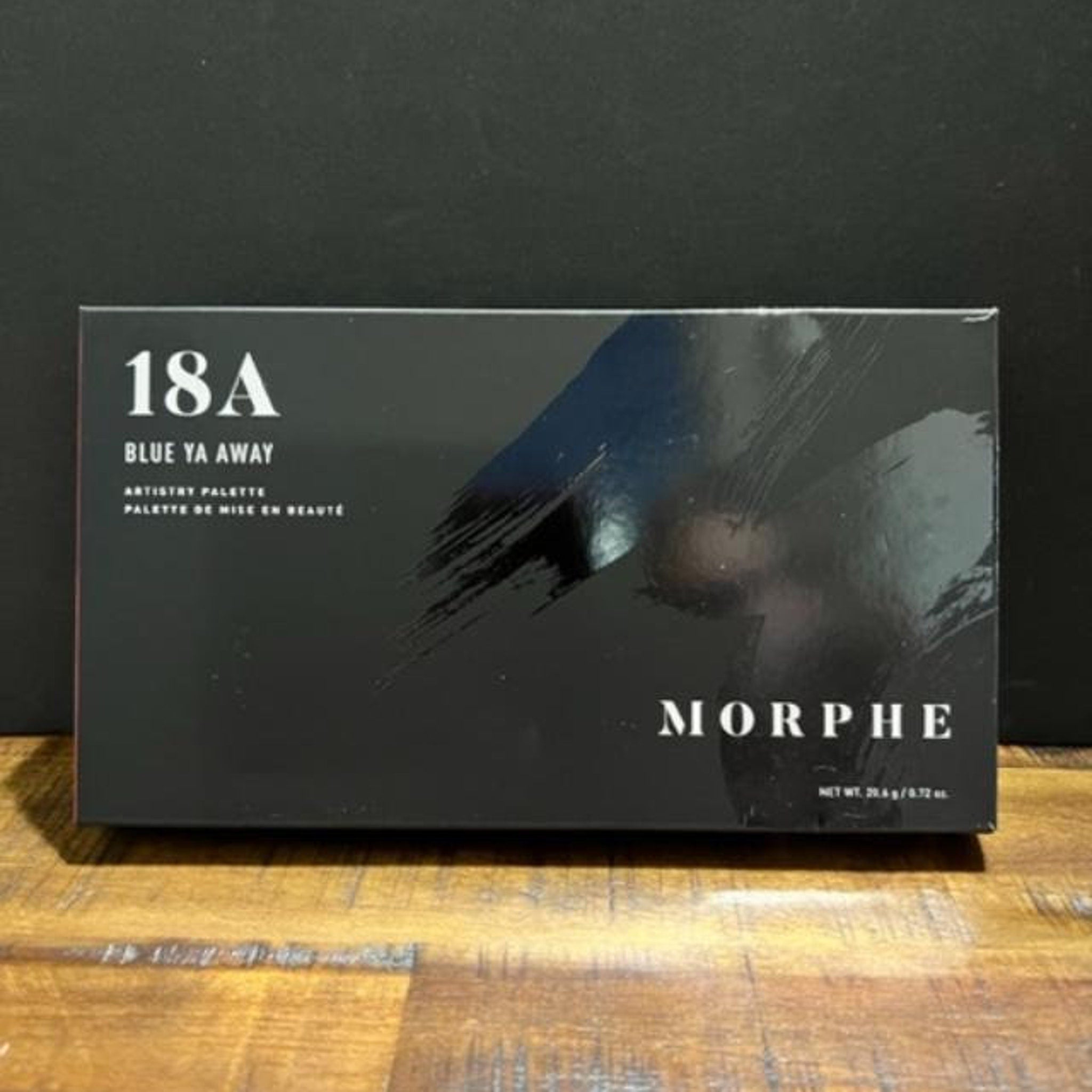 Eyeshadow palette with black background, Morphe brand name, and blue brushstroke pattern on the front