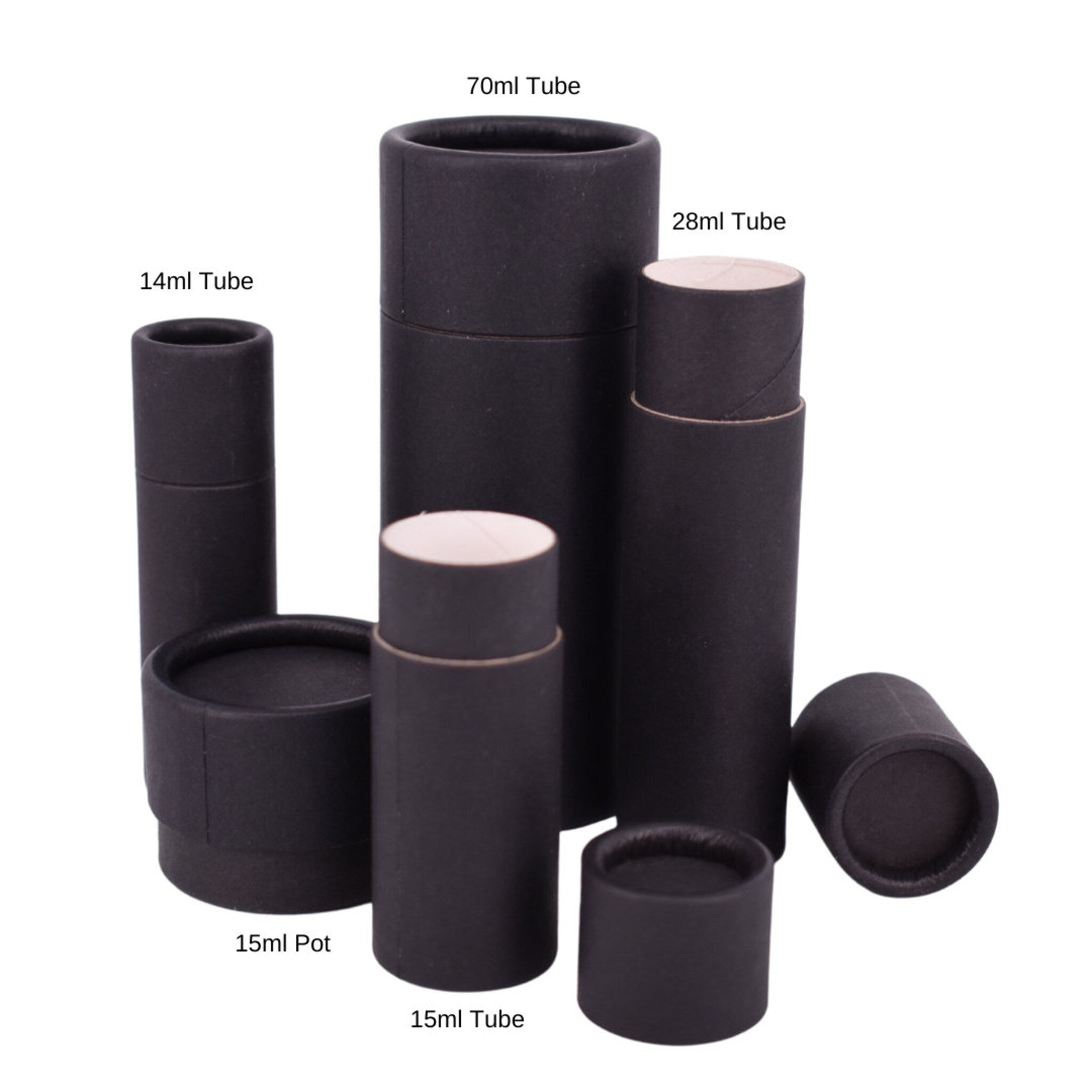 Cardboard tubes in black with various sizes and shapes, some with white interiors