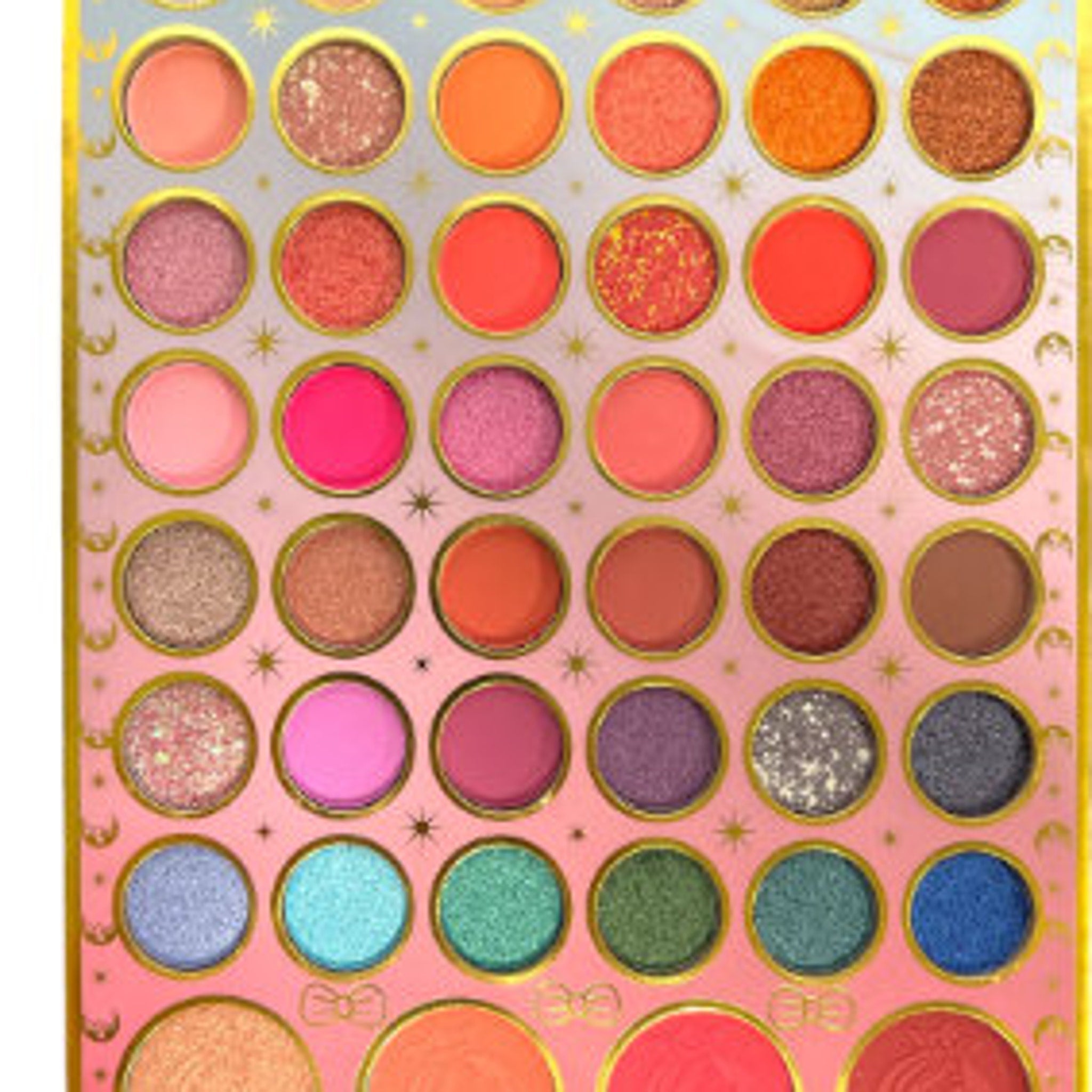 Close-up of 46 vibrant eyeshadow shades in matte, shimmer, and metallic finishes arranged in rectangular palette