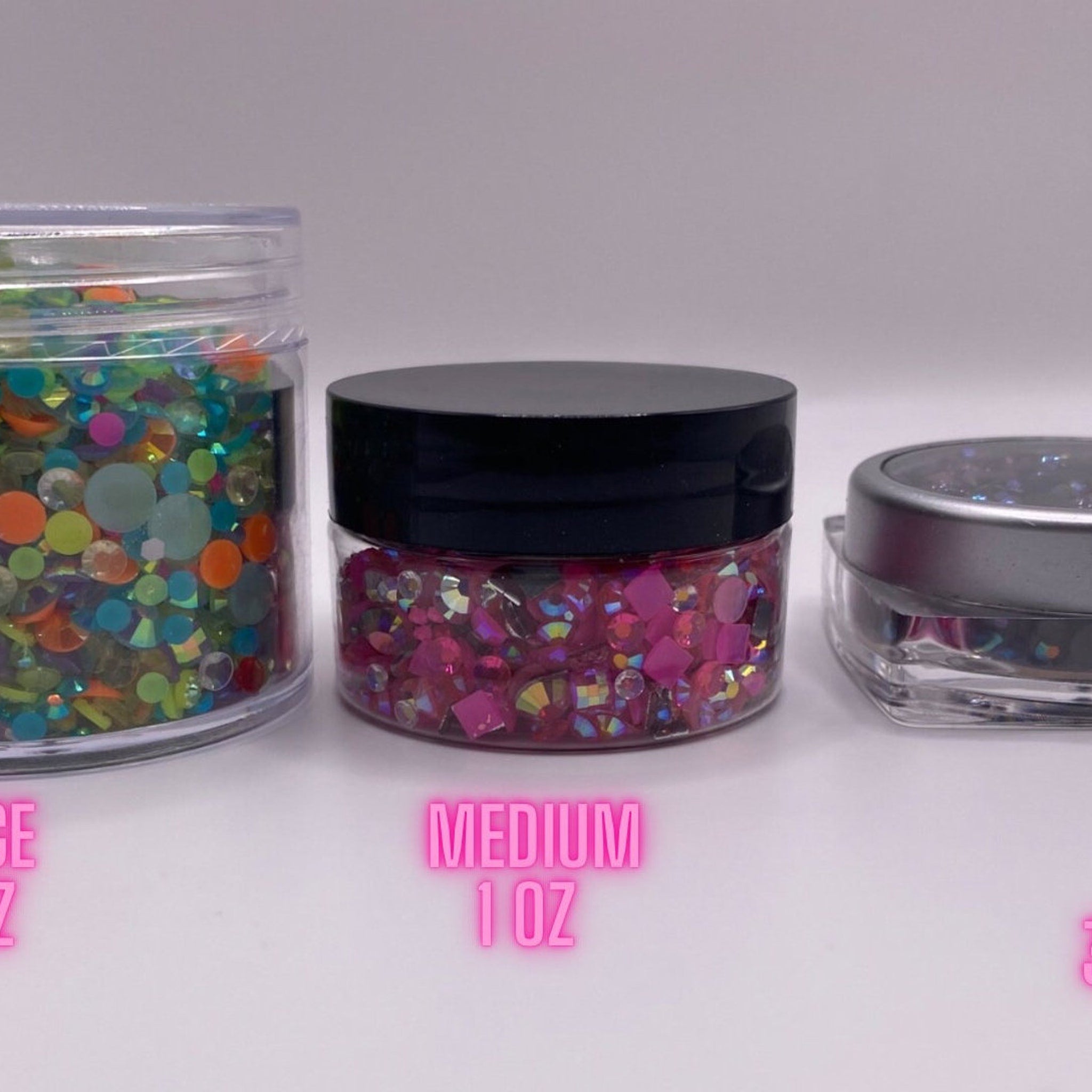 Rhinestones in clear jars with black and silver lids, various colors and sizes, for crafts